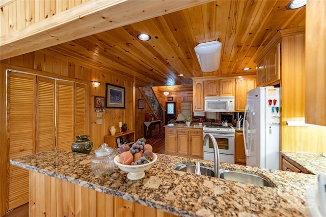 1053 Rich Hill Mountain Rd, Glade Valley, NC 28627 - kitchen with wood ceiling, light stone countertops, a sink, recessed lighting, and white appliances