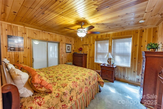1053 Rich Hill Mountain Rd, Glade Valley, NC 28627 - bedroom featuring wooden walls, a ceiling fan, light colored carpet, and wooden ceiling