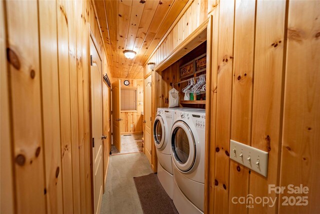 1053 Rich Hill Mountain Rd, Glade Valley, NC 28627 - clothes washing area with wood ceiling, laundry area, independent washer and dryer, wooden walls, and light carpet