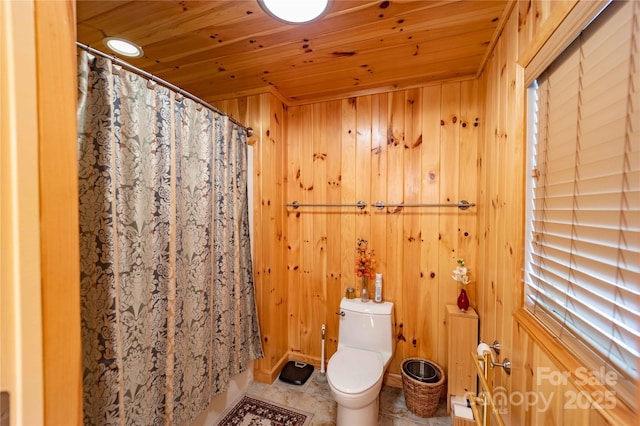 1053 Rich Hill Mountain Rd, Glade Valley, NC 28627 - bathroom featuring wooden walls, wood ceiling, a shower with curtain, and toilet