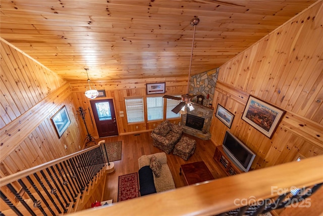 1053 Rich Hill Mountain Rd, Glade Valley, NC 28627 - living area with wood walls, lofted ceiling, wood finished floors, and wooden ceiling