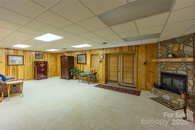 1053 Rich Hill Mountain Rd, Glade Valley, NC 28627 - carpeted living room featuring wood walls and a paneled ceiling