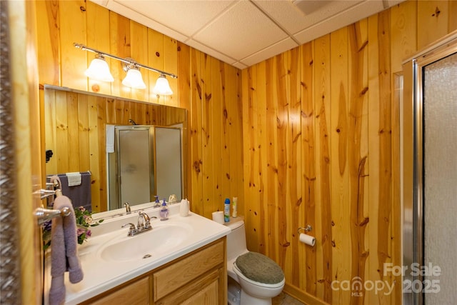 1053 Rich Hill Mountain Rd, Glade Valley, NC 28627 - full bathroom with toilet, wood walls, a shower stall, and vanity