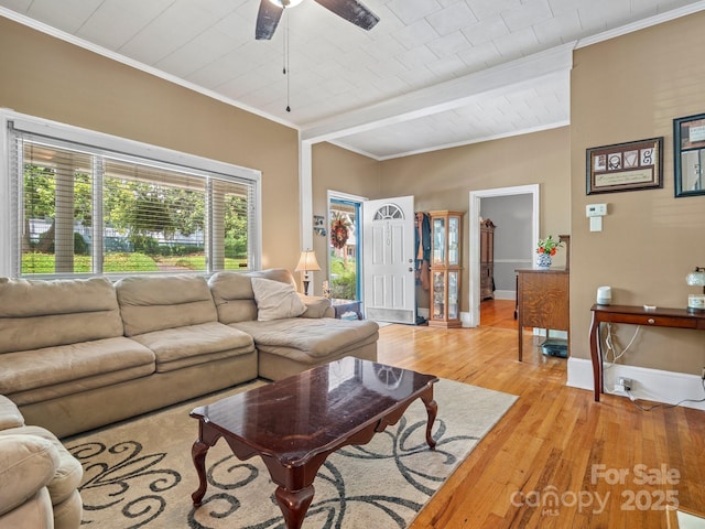 170 8th Ave, Cramerton, NC 28032 - living room featuring light wood-style flooring, a ceiling fan, ornamental molding, and baseboards