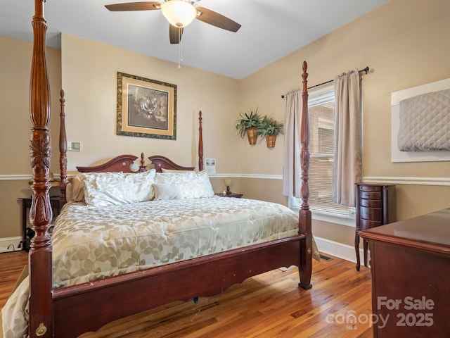 170 8th Ave, Cramerton, NC 28032 - bedroom featuring wood finished floors, baseboards, and ceiling fan