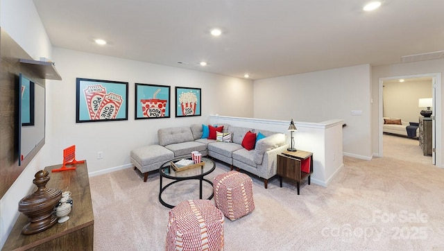 living room with baseboards, light carpet, and recessed lighting