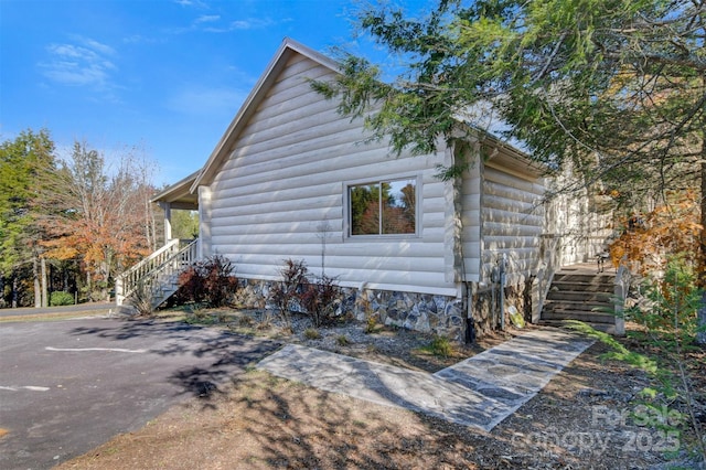 969 Twin Bridges Dr, Fleetwood, NC 28626 - view of home's exterior featuring stairway