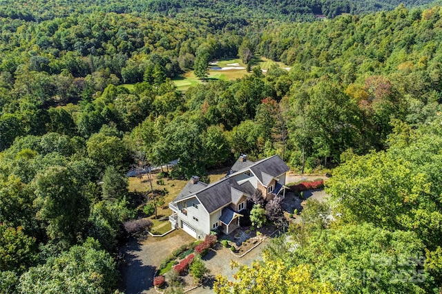 drone / aerial view with a forest view