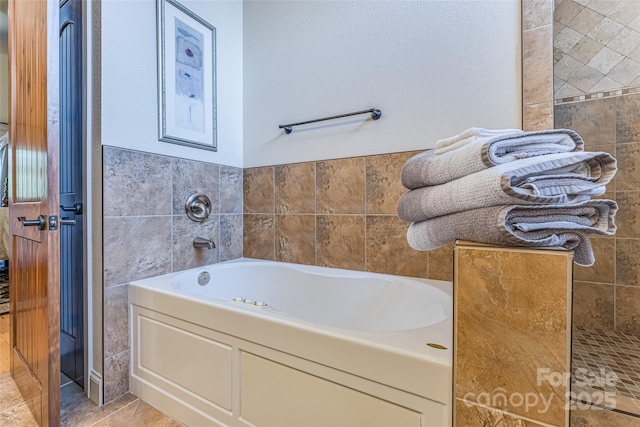 bathroom featuring a bath