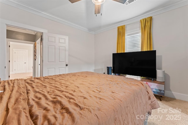 bedroom with crown molding, a ceiling fan, baseboards, and carpet