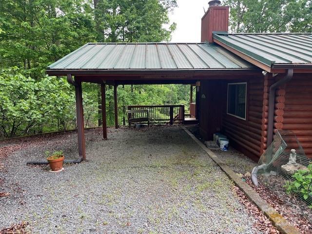 137 Amys Ridge Rd, Lake Lure, NC 28746 - view of parking with gravel driveway and an attached carport