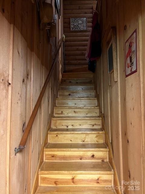 137 Amys Ridge Rd, Lake Lure, NC 28746 - stairs featuring wooden walls, rustic walls, and wood finished floors
