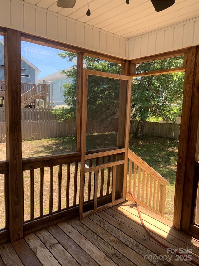 unfurnished sunroom with plenty of natural light