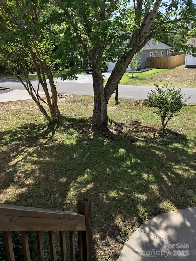 236 35th St NE, Oak Island, NC 28465 - view of yard featuring fence