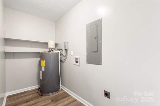 utility room with water heater and electric panel
