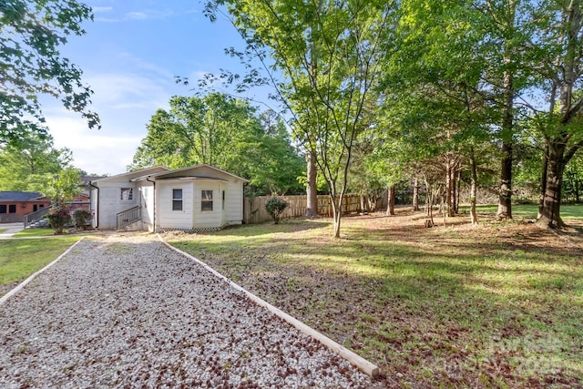 view of yard with fence