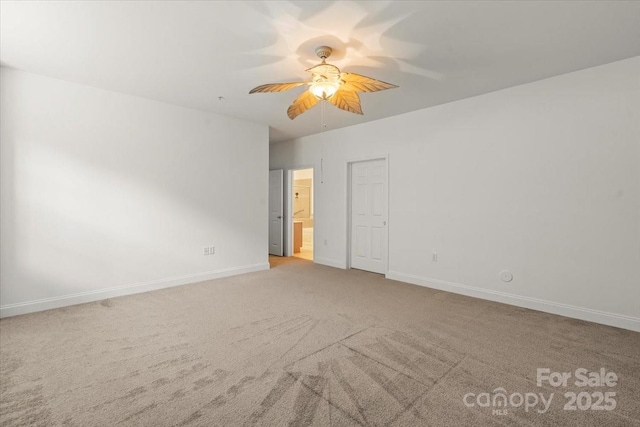 9047 Rosalyn Glen Rd, Cornelius, NC 28031 - empty room featuring carpet, baseboards, and ceiling fan