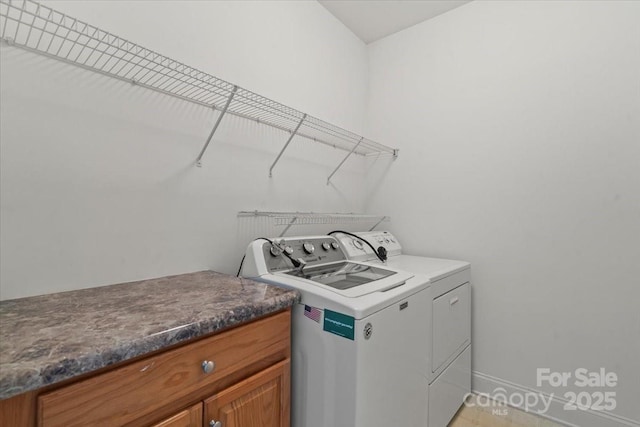 9047 Rosalyn Glen Rd, Cornelius, NC 28031 - clothes washing area with separate washer and dryer and baseboards