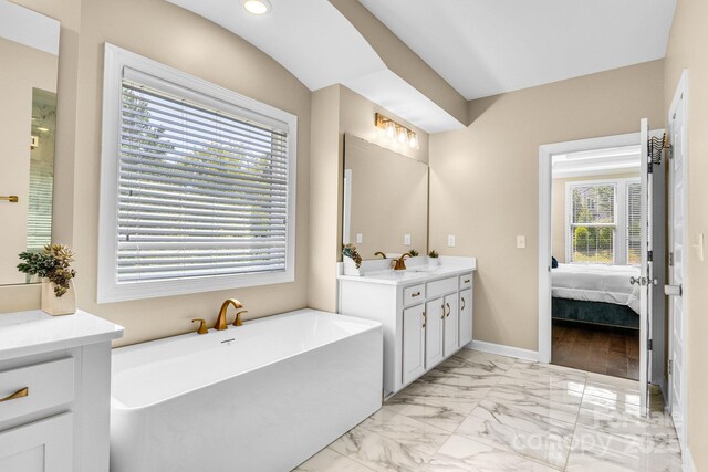 2854 Harlinsdale Dr, Rock Hill, SC 29732 - ensuite bathroom with a freestanding tub, baseboards, vanity, marble finish floor, and ensuite bath