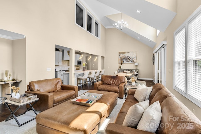 2854 Harlinsdale Dr, Rock Hill, SC 29732 - living area with plenty of natural light, crown molding, a high ceiling, and a notable chandelier