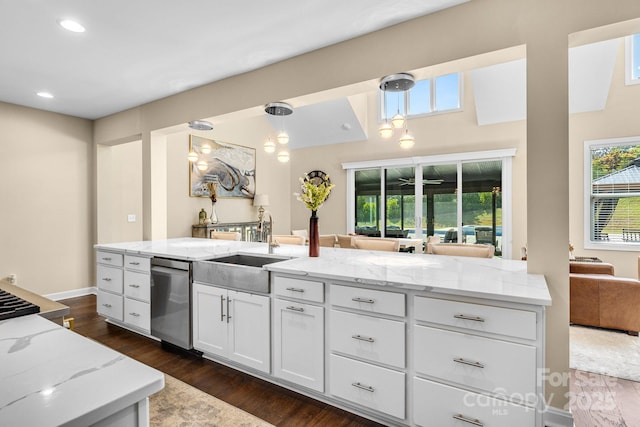 2854 Harlinsdale Dr, Rock Hill, SC 29732 - kitchen with stainless steel dishwasher, a sink, light stone counters, white cabinets, and dark wood-type flooring