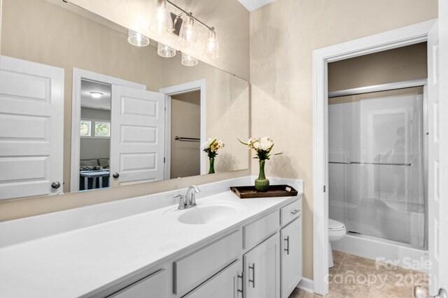 2854 Harlinsdale Dr, Rock Hill, SC 29732 - full bathroom with vanity, tile patterned floors, a shower stall, and toilet