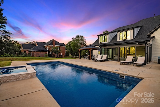 2854 Harlinsdale Dr, Rock Hill, SC 29732 - pool at dusk featuring fence, a gazebo, an outdoor pool, an in ground hot tub, and a patio