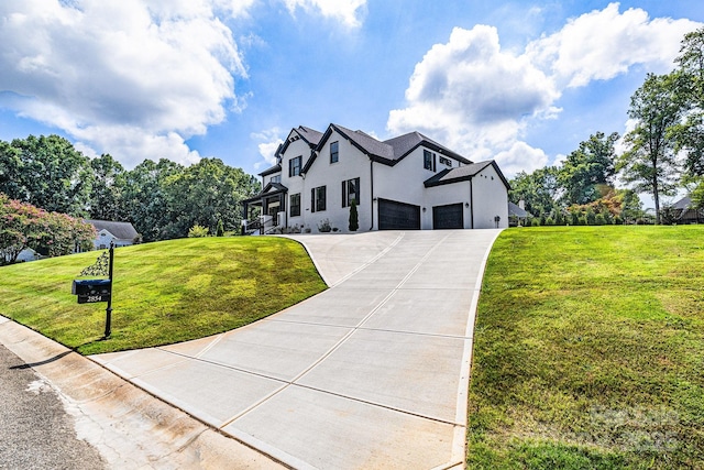 2854 Harlinsdale Dr, Rock Hill, SC 29732 - view of front of home with an attached garage, a front lawn, stucco siding, and concrete driveway