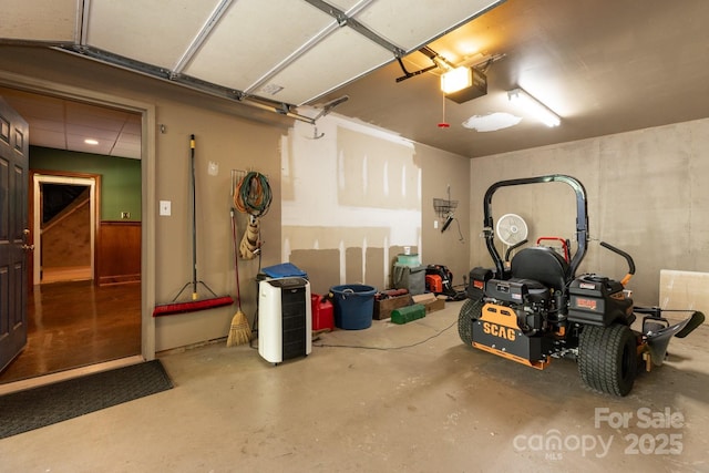 garage featuring a garage door opener