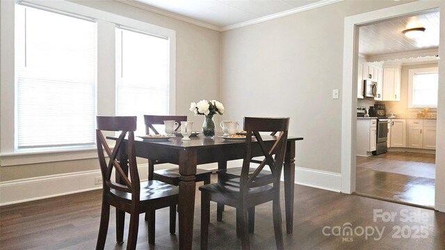 169 Freeze Ave NW, Concord, NC 28025 - dining room featuring ornamental molding and dark wood-type flooring