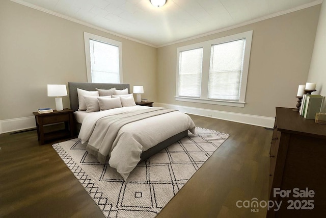 169 Freeze Ave NW, Concord, NC 28025 - bedroom with dark wood finished floors, crown molding, and multiple windows