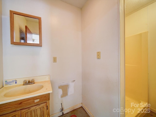 4901 Pine Oaks Dr, Monroe, NC 28112 - bathroom with baseboards and vanity