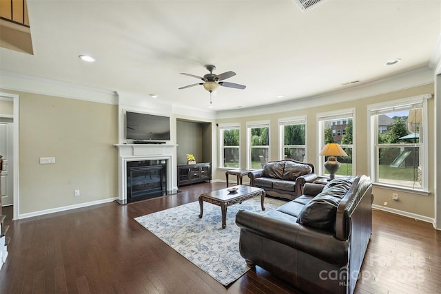 9825 Ardrey Woods Dr, Charlotte, NC 28277 - living area featuring crown molding, a fireplace with flush hearth, baseboards, and ceiling fan