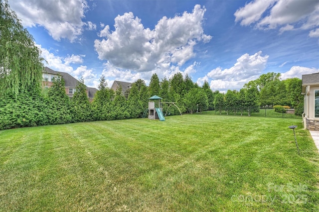 9825 Ardrey Woods Dr, Charlotte, NC 28277 - view of yard with fence and a playground