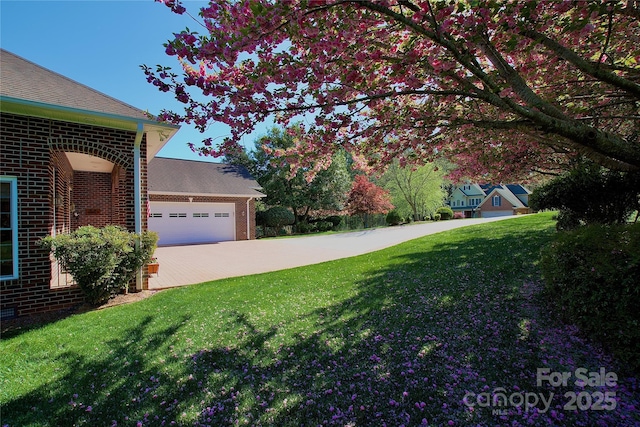 5342 Beacon Ridge Dr, Granite Falls, NC 28630 - view of grassy yard with driveway and a garage