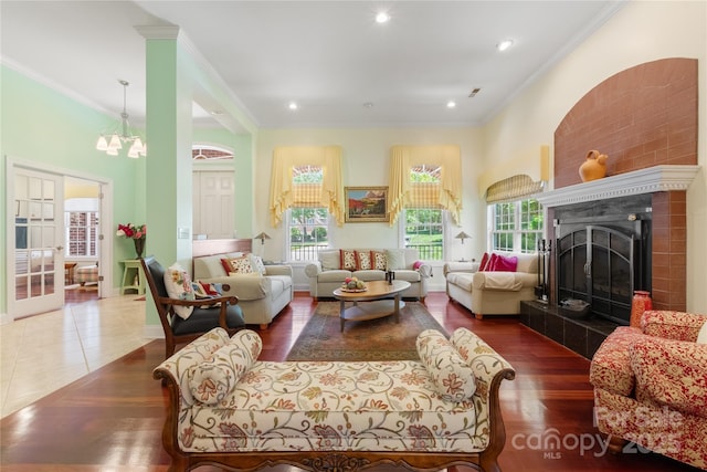 5342 Beacon Ridge Dr, Granite Falls, NC 28630 - living area with plenty of natural light, crown molding, wood finished floors, a fireplace, and recessed lighting