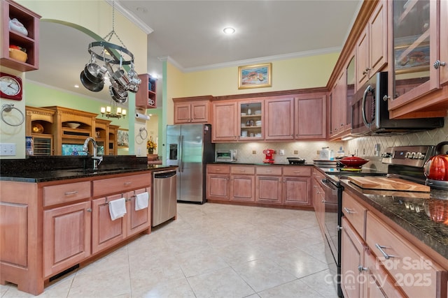 5342 Beacon Ridge Dr, Granite Falls, NC 28630 - kitchen with appliances with stainless steel finishes, crown molding, a sink, backsplash, and light tile patterned floors