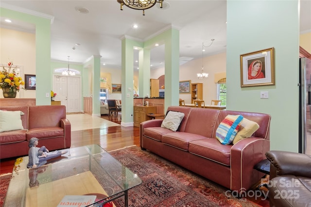 5342 Beacon Ridge Dr, Granite Falls, NC 28630 - living area with a chandelier, wood finished floors, ornamental molding, recessed lighting, and baseboards