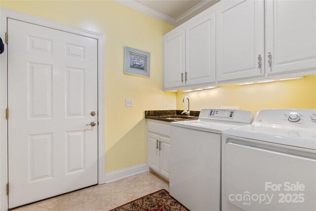 5342 Beacon Ridge Dr, Granite Falls, NC 28630 - laundry area with washing machine and dryer, cabinet space, ornamental molding, and baseboards
