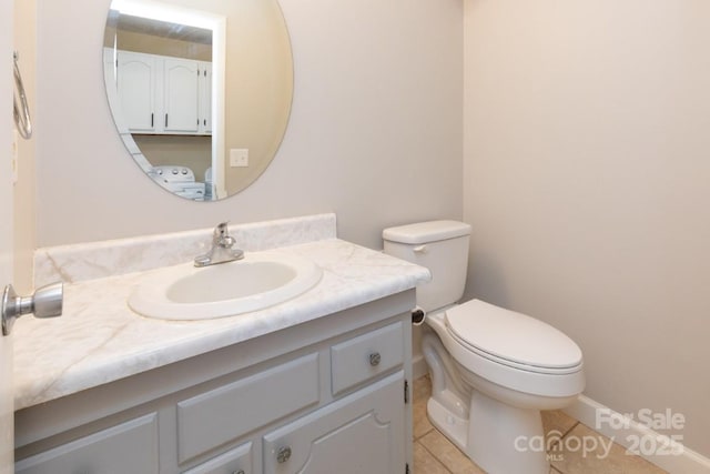 87 Marion Forest Rd Unit 8, Sylva, NC 28779 - bathroom featuring toilet, tile patterned flooring, and vanity