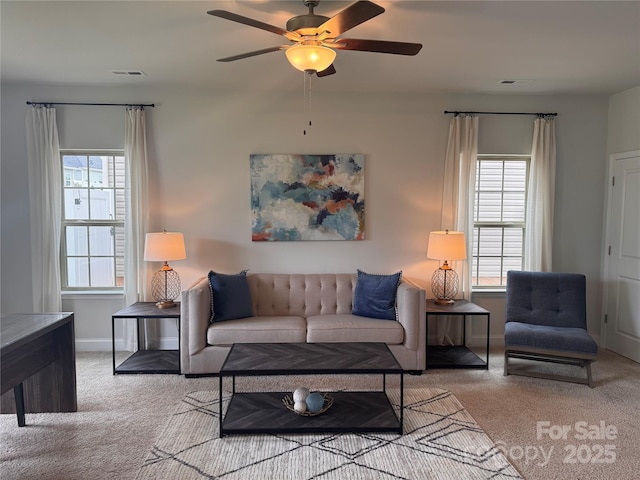 704 Robert Moses Dr Unit 121, Gastonia, NC 28056 - living area featuring carpet floors, ceiling fan, visible vents, and a wealth of natural light