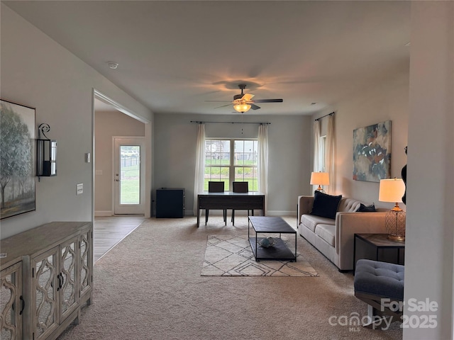 704 Robert Moses Dr Unit 121, Gastonia, NC 28056 - living room with baseboards, carpet, and ceiling fan