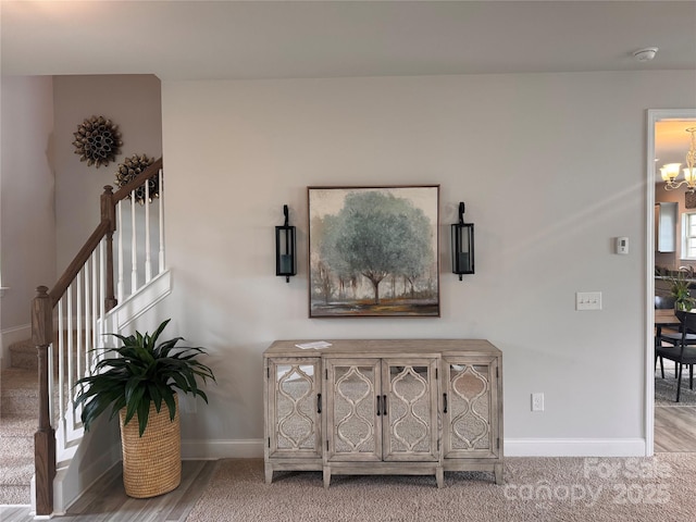 704 Robert Moses Dr Unit 121, Gastonia, NC 28056 - interior space featuring carpet floors, baseboards, and a chandelier