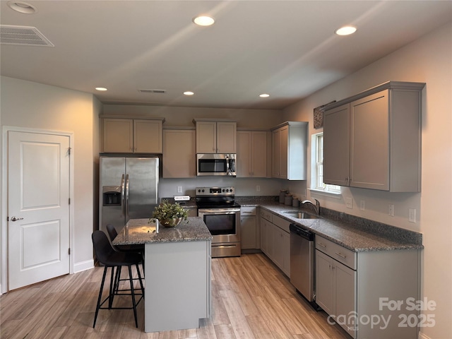 704 Robert Moses Dr Unit 121, Gastonia, NC 28056 - kitchen featuring a sink, appliances with stainless steel finishes, gray cabinets, and recessed lighting