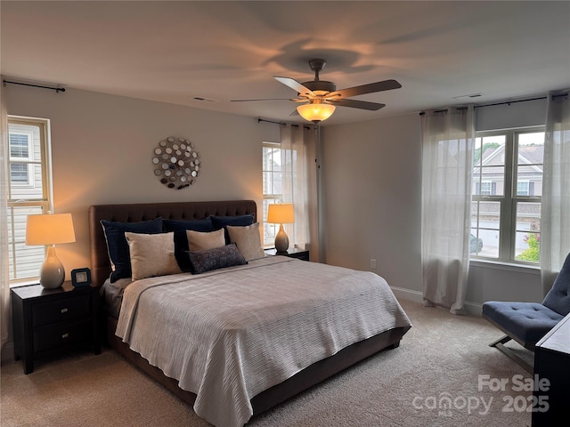 704 Robert Moses Dr Unit 121, Gastonia, NC 28056 - bedroom with visible vents, light carpet, and multiple windows