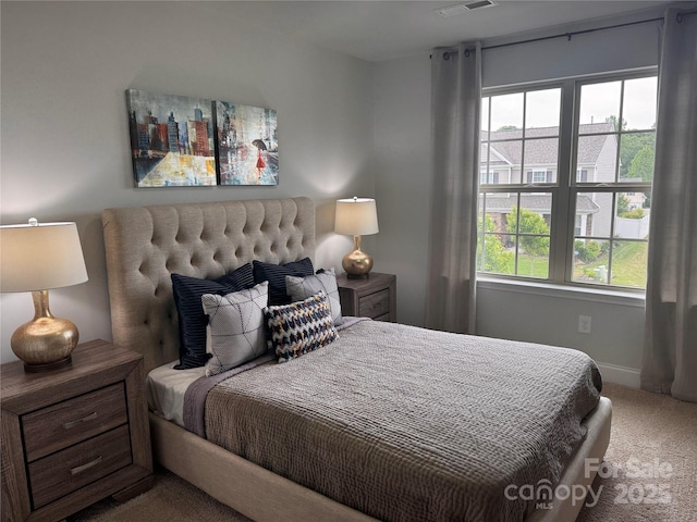 704 Robert Moses Dr Unit 121, Gastonia, NC 28056 - bedroom featuring baseboards, multiple windows, carpet, and visible vents