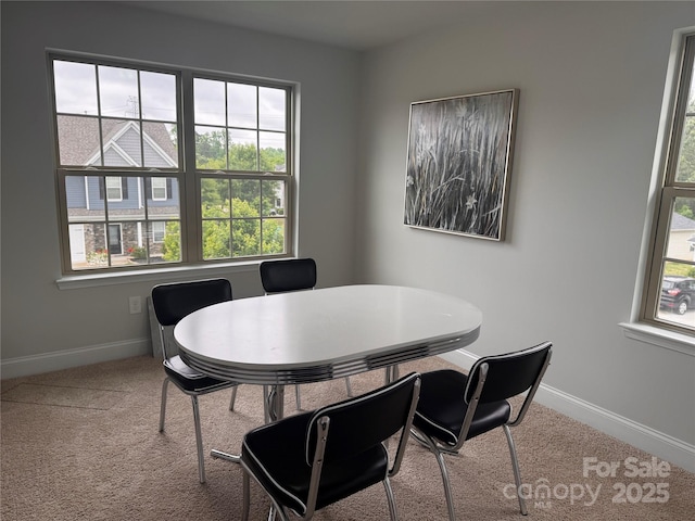 704 Robert Moses Dr Unit 121, Gastonia, NC 28056 - carpeted dining room featuring baseboards