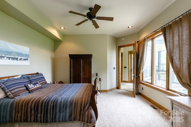 carpeted bedroom featuring baseboards, multiple windows, recessed lighting, and visible vents
