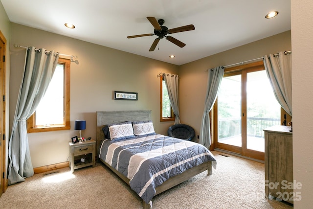 carpeted bedroom with access to outside, visible vents, ceiling fan, and recessed lighting