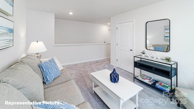 living room featuring carpet, recessed lighting, and baseboards